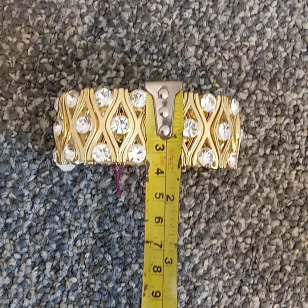 Gold tone and crystal stretch bracelet